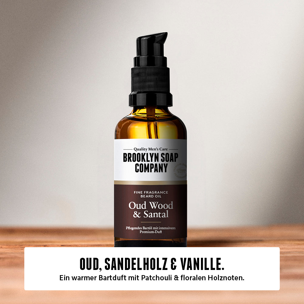 Brooklyn Soap Bartöl Oud Wood & Santal auf Holzoberfläche, mit Duftbeschreibung: Oud, Sandelholz und Vanille – ein warmer Bartduft mit Patchouli und floralen Holznoten.